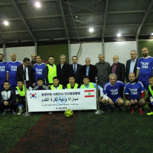 Dr. Hassan Tajideen Presenting a Peace Cup to the Korean Battalion Football Team
