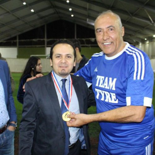 Dr. Hassan Tajideen Presenting a Peace Cup to the Korean Battalion Football Team
