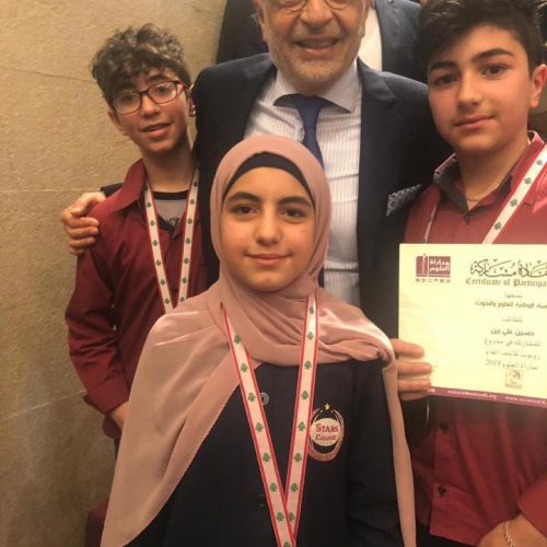 Dr. Hassan Tajideen Celebrating with Stars College Students the joy of success in accomplishing the second ranking in National Science Competition organized by the National Association for Research and Science