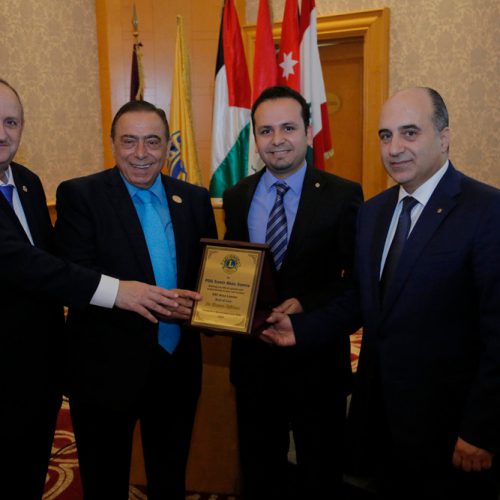 Dr. Hassan Tajideen honoring Samir Abu Samra for his new post of GAT Area Leader